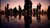 Silhouette of standing on reflective surface