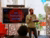 Dr Tsegaye Moreda speaks in front of staff members to present his chapter in a newbook.