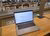 Laptop on workspace in University Library