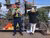 Policeman and protester at fence - Pūtiki protest Waiheke Island, New Zealand