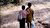 Children walking barefoot in forest (cut)