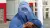 Afghan woman in blue burqa