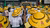Myanmar - people sitting in yellow hats