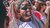 Laughing woman at LGBTQIA+ pride
