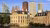 A photo featuring a mix of government buildings, high-rise apartments and more that make up The Hague's city skyline