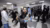 Man running through hospital with injured child in Gaza