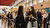 Two prospective students walk around the information market during the Master Open Day.