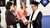 Doi Ra receiving her PhD certificate from Jun Borras
