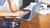 person working at a desk with laptop