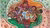 RRUSHES-5 painting people around a globe