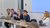 A panel hosted by Migration Policy Institute Europe (MPIE) sits on stage during PACES final conference