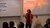 Marianna Balaba wearing a red jacket speaking during the IDS-ISS seminar
