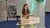 Nina Swen in green top standing behind lectern during her PhD defence