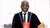 Delu Lusambya with his PhD gown and diploma