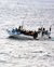 Boat with refugees on water