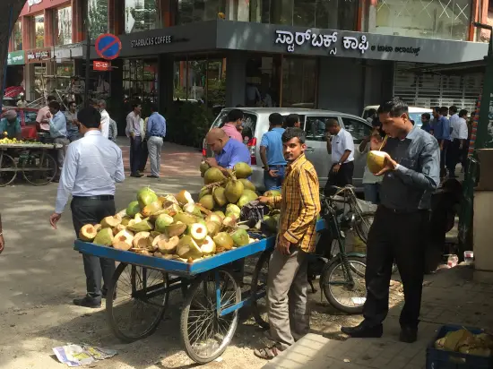 Man selling coconuts in Bangalore